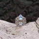 Bague en argent et topaze bleue